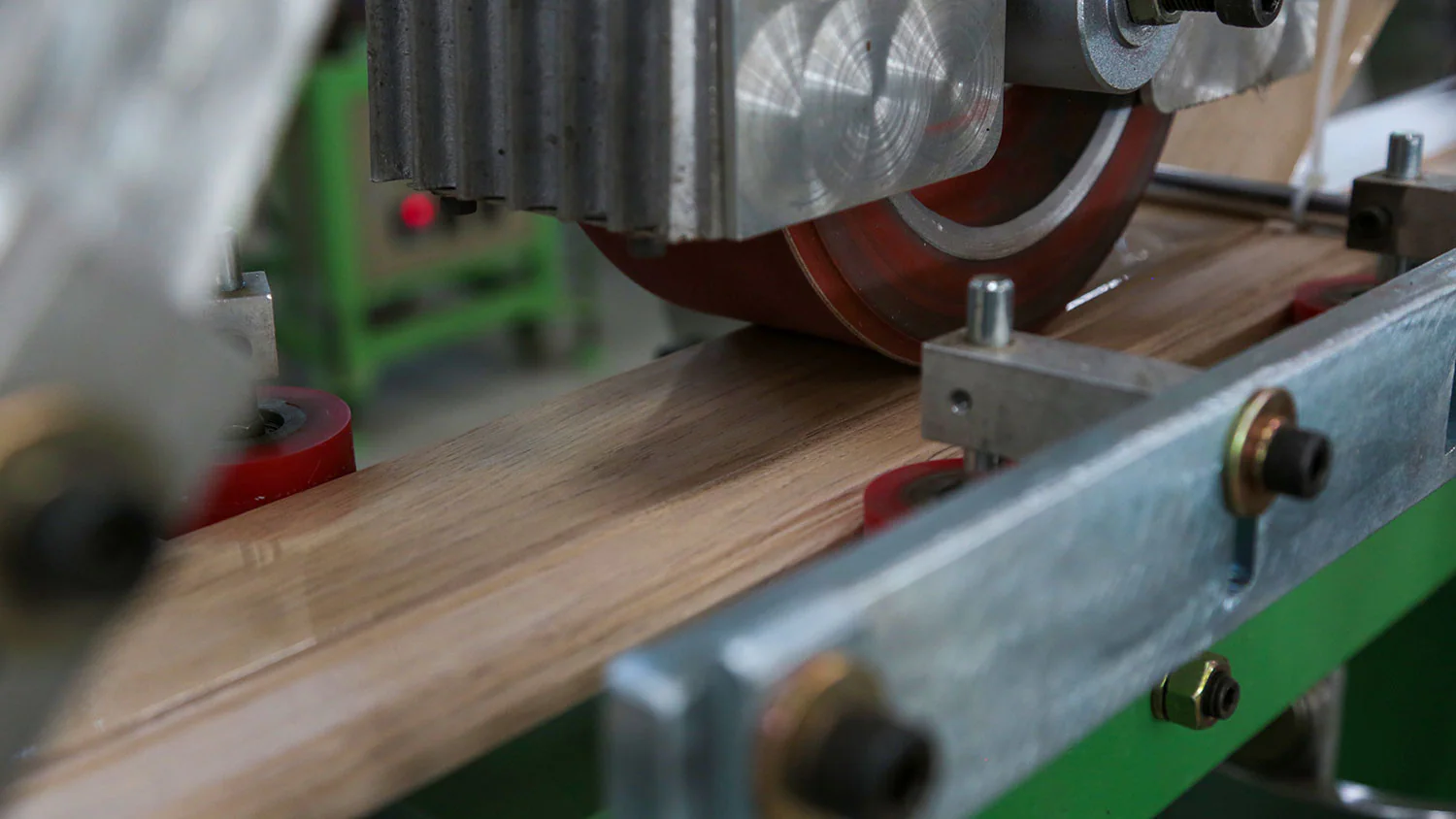 Close view of a decorative profile being processed on DECOMASTER equipment